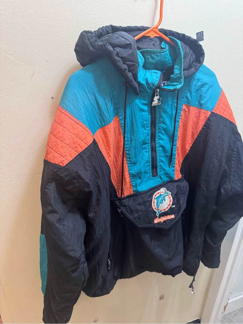 vintage 1990s Miami Dolphins Starter hooded jacket in black, teal, & orange L